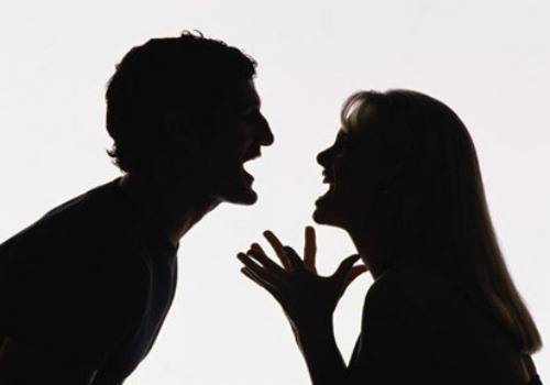 man abusing woman silhouette