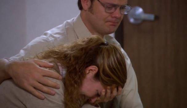 man soothing a woman-PMS symptoms