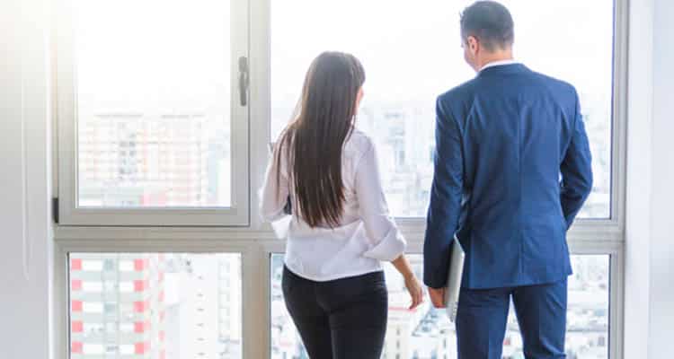 Woman and man together in office