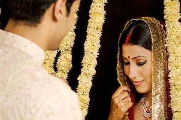 shy-indian-bride-with-groom-e1500692836541