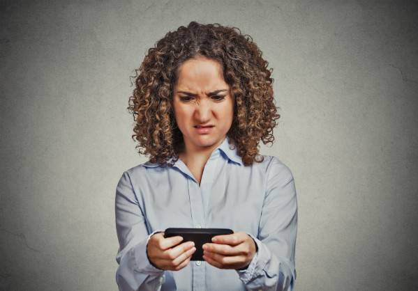 woman looking at phone