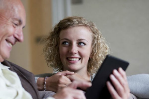 Young woman with old man