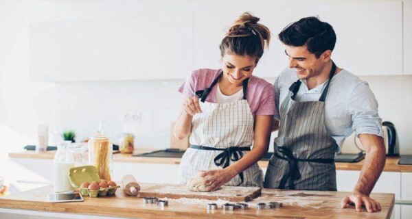 Couple baking together