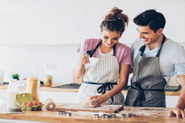 Couple baking together