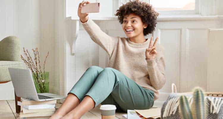 Woman makes video call with cell phone