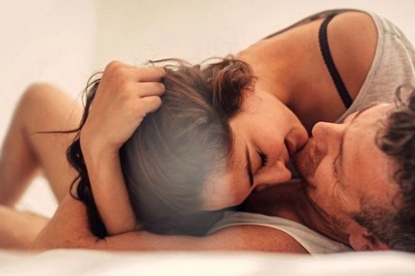 a-couple-cuddling-in-bed