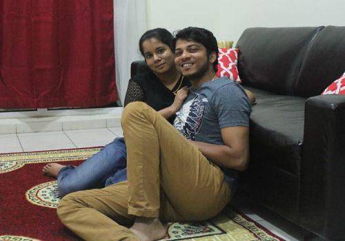 couple together near couch