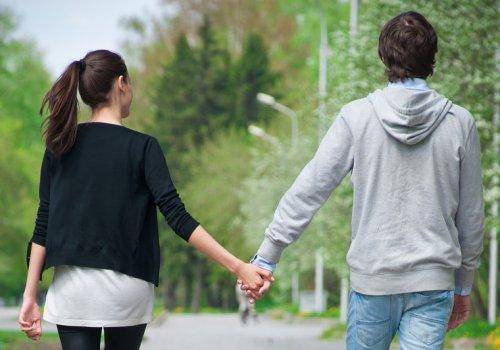couple-walking-on-road