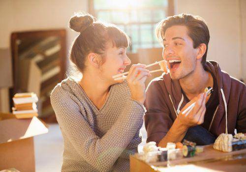 happy couple eating together