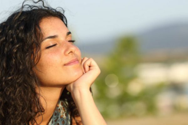 Happy single woman smiling