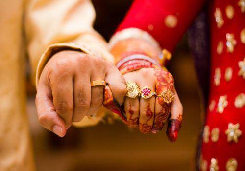 indian married couple hands