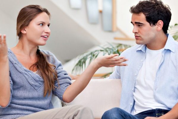 man and woman talking on something