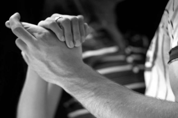 man-with-fingers-crosed