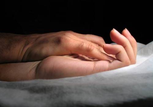 two hands in each other