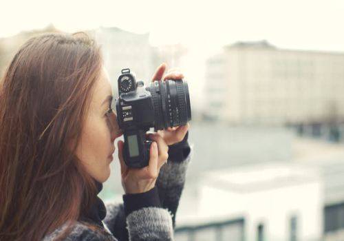 woman taking photos