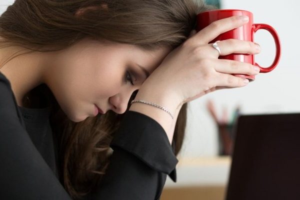 An upset female employee at office