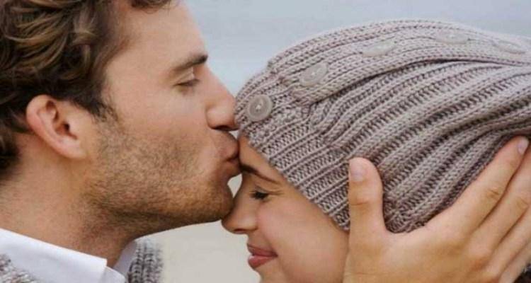 Man-kiss-on-her-womansForehead