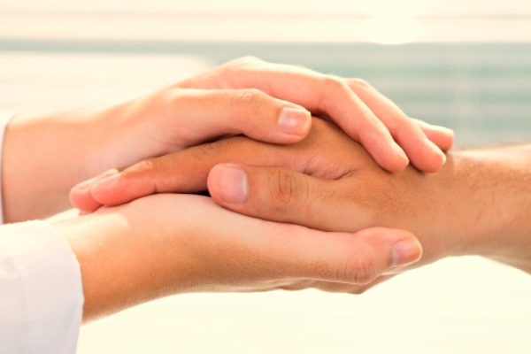 couple hands on hands
