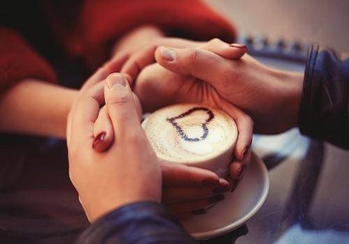 couple-holding-cup