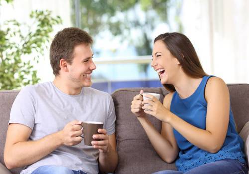 couple laughing loud together