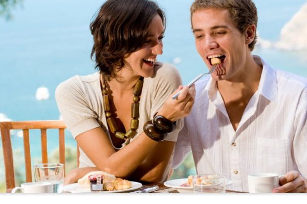 happy couple eating together