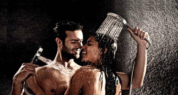 hot man and woman taking shower together