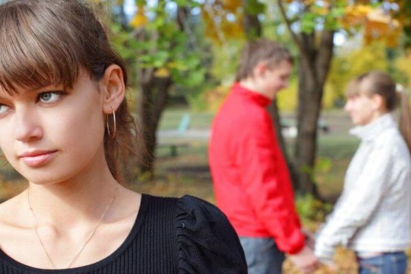 jealous woman seeing man with other woman