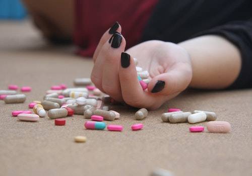 lady with drug pills
