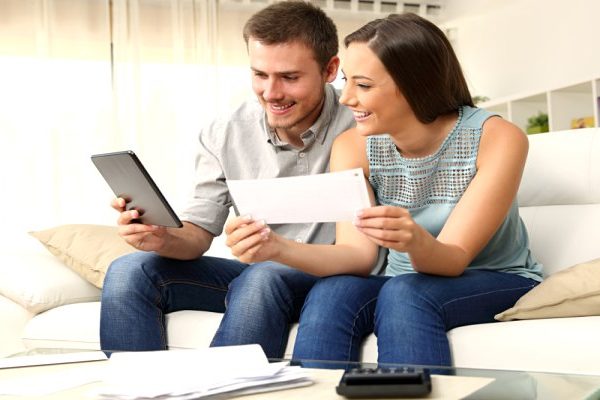 man and woman doing finance together