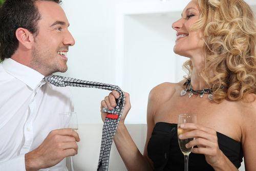 man and woman taking seductively