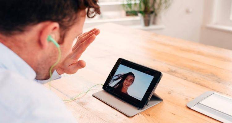 man talking to girl via video call