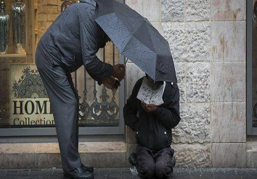 man-helping-the-homeless