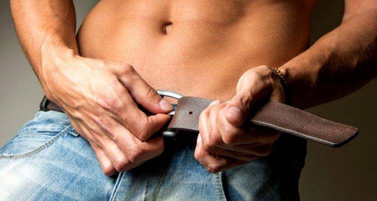 man undo his belt