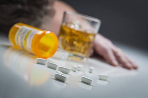 man with drug pills