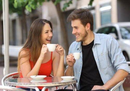 man and woman having a coffee