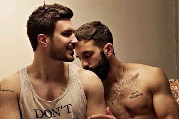 two man doing love