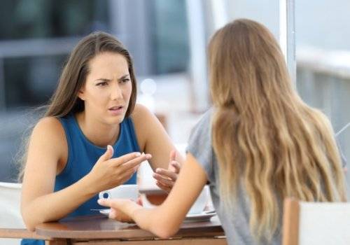 two woman talking