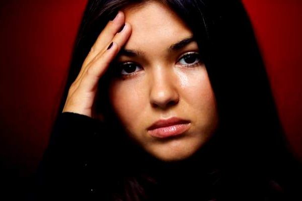 Closeup-of-an-upset-woman-in-black-clothes