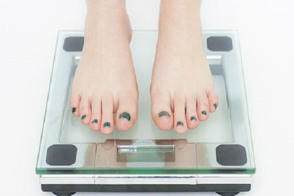 Woman-on-Weight-Machine
