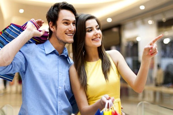 man and woman shopping