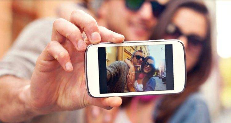 man-and-woman-taking-selfie
