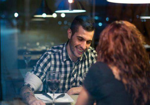 man-in-conversation-with-woman