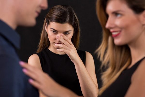 man with two woman