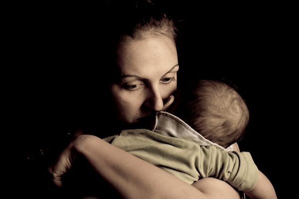 sad lady with child