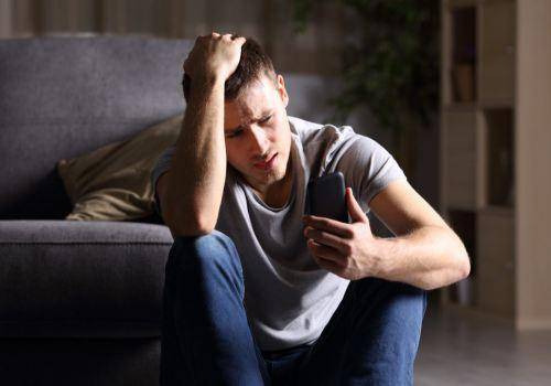sad-man-with-phone