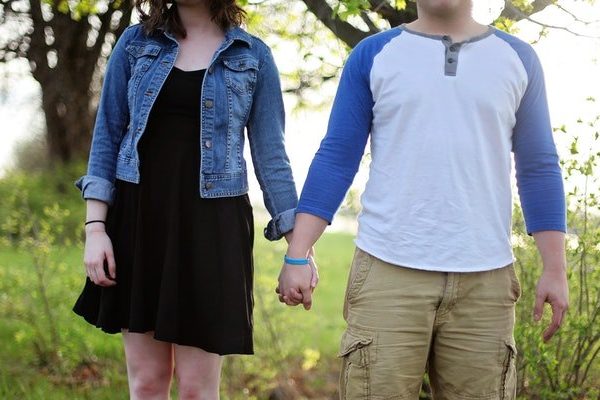 young couple holding hands
