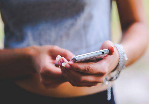 lady-checking-phone-and-texting