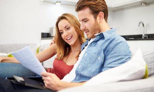 man and woman seeing papers