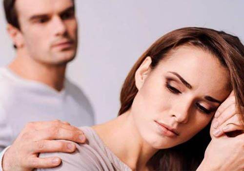sad woman supported by husband