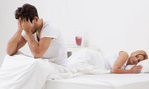 stressed man with wife